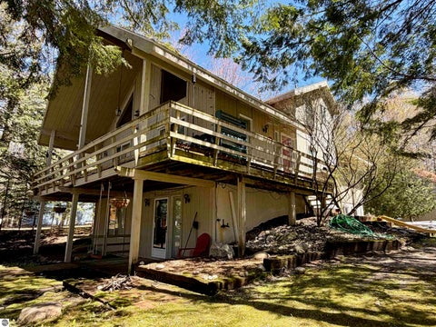 Tiny photo for 724 S Golden Beach Drive, Kewadin, MI 49648 (MLS # 1945453)