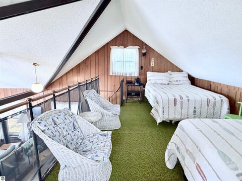 Tiny photo for 724 S Golden Beach Drive, Kewadin, MI 49648 (MLS # 1945453)