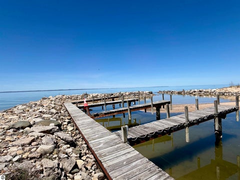 Tiny photo for 724 S Golden Beach Drive, Kewadin, MI 49648 (MLS # 1945453)