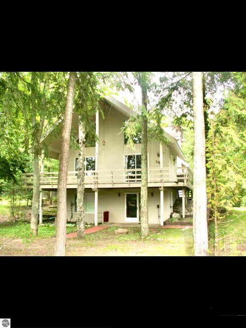 Tiny photo for 724 S Golden Beach Drive, Kewadin, MI 49648 (MLS # 1945453)
