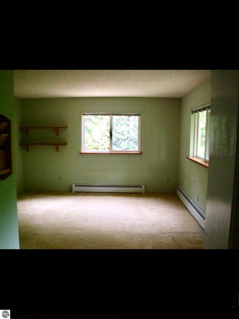 Tiny photo for 724 S Golden Beach Drive, Kewadin, MI 49648 (MLS # 1945453)
