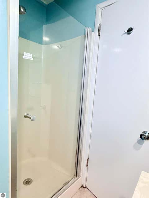 Tiny photo for 724 S Golden Beach Drive, Kewadin, MI 49648 (MLS # 1945453)