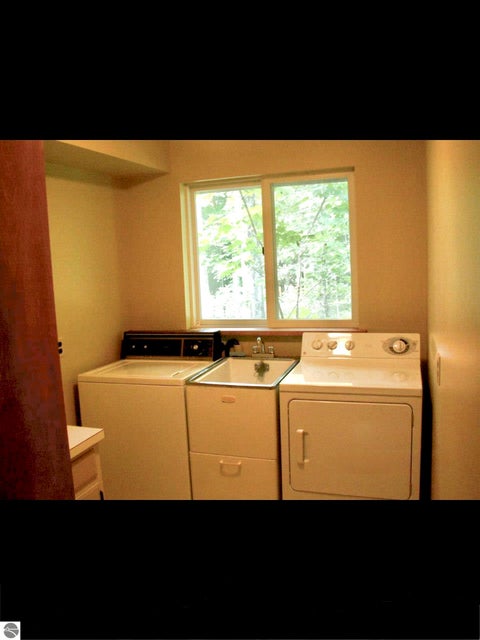 Tiny photo for 724 S Golden Beach Drive, Kewadin, MI 49648 (MLS # 1945453)