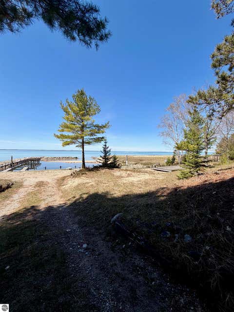 Tiny photo for 724 S Golden Beach Drive, Kewadin, MI 49648 (MLS # 1945453)