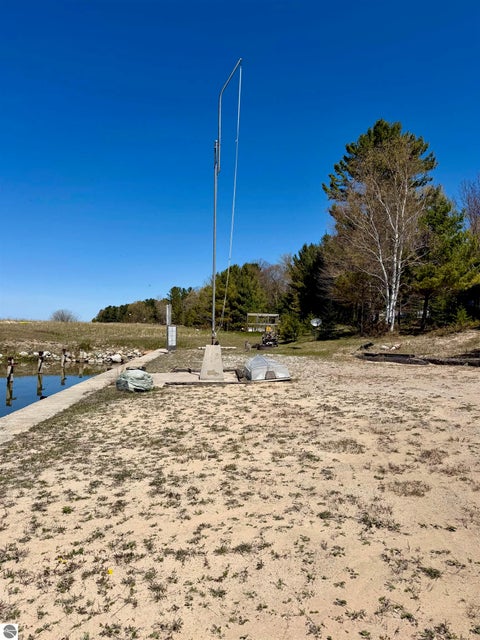 Tiny photo for 724 S Golden Beach Drive, Kewadin, MI 49648 (MLS # 1945453)