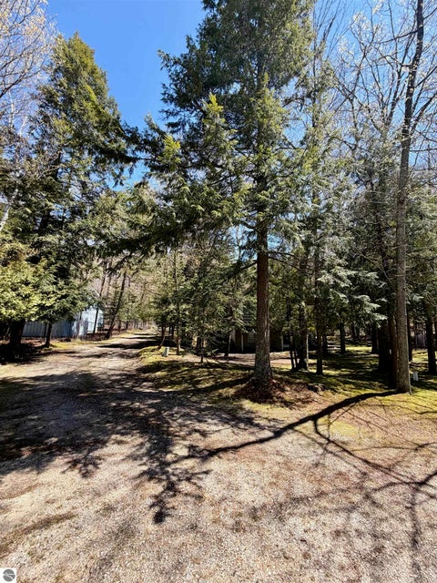 Tiny photo for 724 S Golden Beach Drive, Kewadin, MI 49648 (MLS # 1945453)