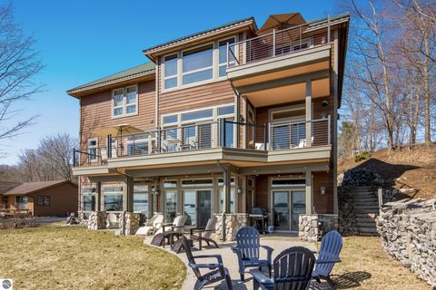 Photo of 3901 Torch Lake Drive,NW Dr, Kewadin, MI 49648 (MLS # 1943753)