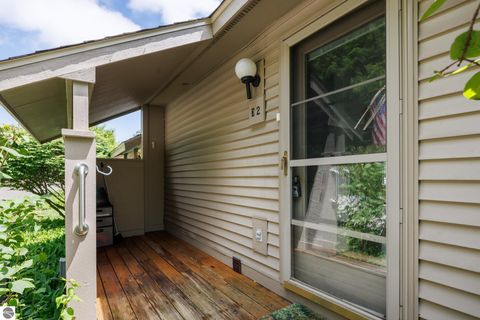 Tiny photo for 11255 E Fort Road #E-2, Suttons Bay, MI 49682 (MLS # 1947471)