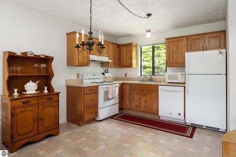 Tiny photo for 11255 E Fort Road #E-2, Suttons Bay, MI 49682 (MLS # 1947471)
