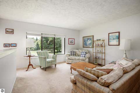Tiny photo for 11255 E Fort Road #E-2, Suttons Bay, MI 49682 (MLS # 1947471)