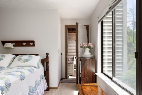 Tiny photo for 11255 E Fort Road #E-2, Suttons Bay, MI 49682 (MLS # 1947471)