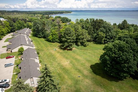 Tiny photo for 11255 E Fort Road #E-2, Suttons Bay, MI 49682 (MLS # 1947471)