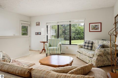 Tiny photo for 11255 E Fort Road #E-2, Suttons Bay, MI 49682 (MLS # 1947471)