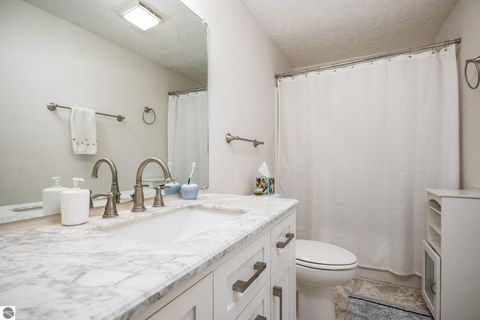 Tiny photo for 11255 E Fort Road #E-2, Suttons Bay, MI 49682 (MLS # 1947471)