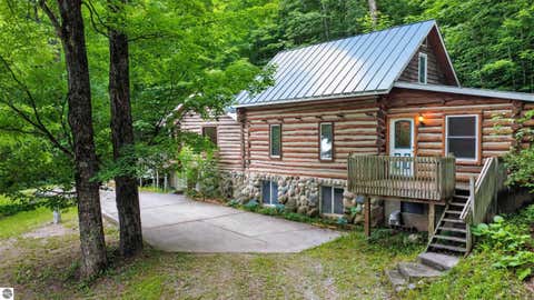 Photo of 5885 Cedar Valley Road, Traverse City, MI 49684 (MLS # 1947125)