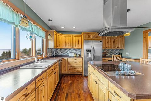 Tiny photo for 11660 Indian Road, Kewadin, MI 49648 (MLS # 1943740)