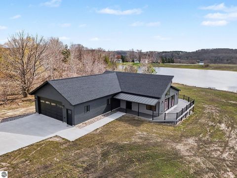 Photo of 9132 Blue Gill Road, Ellsworth, MI 49729 (MLS # 1944143)