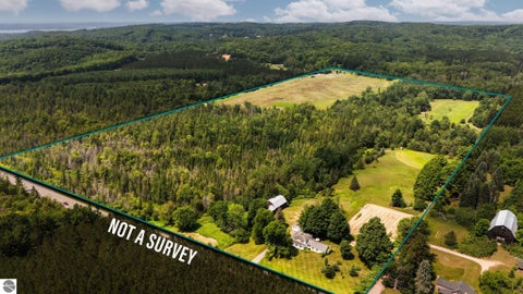 Photo of 7741 S M-88 HWY, Mancelona, MI 49659 (MLS # 1948680)