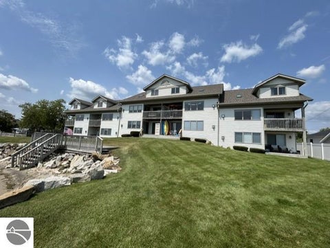 Photo of 637 W Lake Street, Tawas City, MI 48763 (MLS # 1948469)