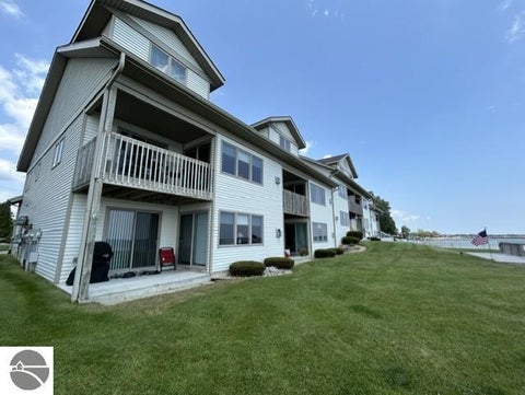 Tiny photo for 637 W Lake Street, Tawas City, MI 48763 (MLS # 1948469)