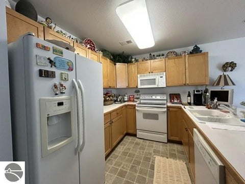Tiny photo for 637 W Lake Street, Tawas City, MI 48763 (MLS # 1948469)