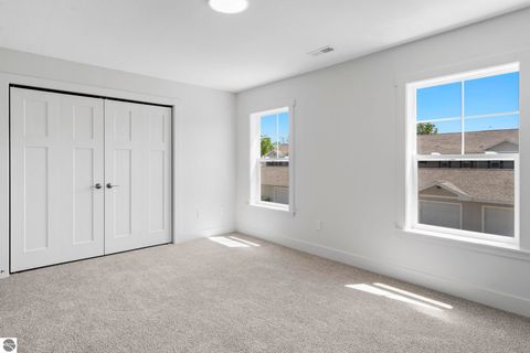 Tiny photo for 1548 Simsbury Street #9, Traverse City, MI 49686 (MLS # 1946195)
