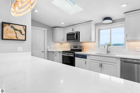 Tiny photo for 4136 Lakeshore, Boyne City, MI 49712 (MLS # 1943384)