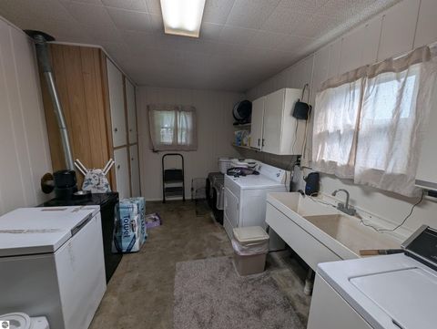 Tiny photo for 620 Burt Street, Au Gres, MI 48703 (MLS # 1943063)