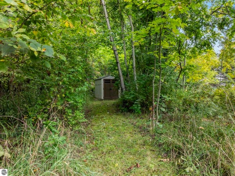 Tiny photo for 355 Meguzee Point, Elk Rapids, MI 49629 (MLS # 1950922)