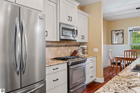 Tiny photo for 355 Meguzee Point, Elk Rapids, MI 49629 (MLS # 1950922)