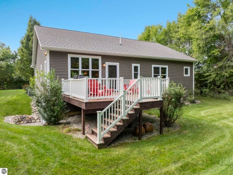 Tiny photo for 355 Meguzee Point, Elk Rapids, MI 49629 (MLS # 1950922)