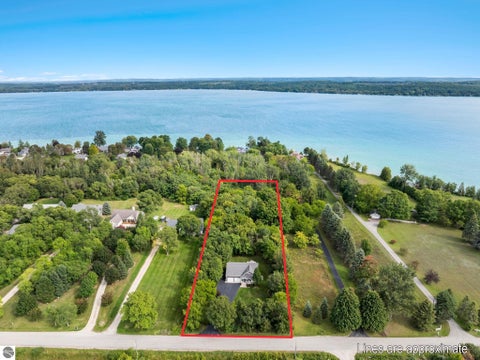 Tiny photo for 355 Meguzee Point, Elk Rapids, MI 49629 (MLS # 1950922)