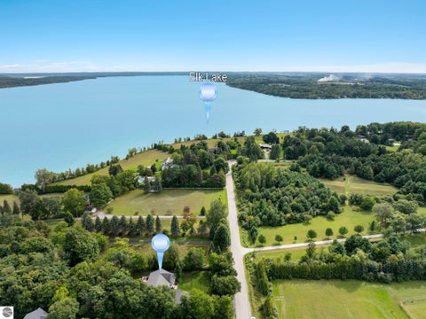 Tiny photo for 355 Meguzee Point, Elk Rapids, MI 49629 (MLS # 1950922)