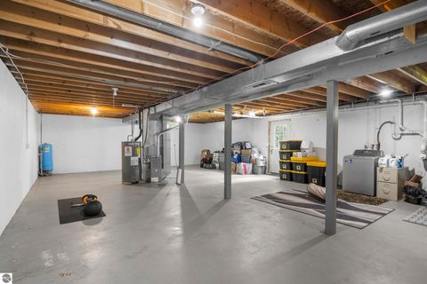 Tiny photo for 994 US-31 N, Kewadin, MI 49648 (MLS # 1942804)