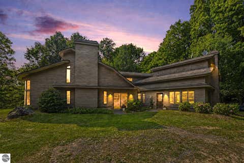 Photo of 715 Sequanota RD, East Jordan, MI 49727 (MLS # 1949537)