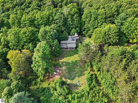 Tiny photo for 715 Sequanota RD, East Jordan, MI 49727 (MLS # 1949537)