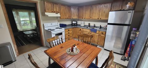 Tiny photo for 1988 N Us31, Kewadin, MI 49648 (MLS # 1948258)