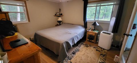 Tiny photo for 1988 N Us31, Kewadin, MI 49648 (MLS # 1948258)
