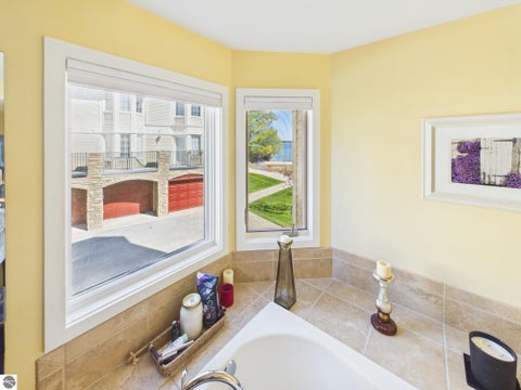 Tiny photo for 710 N Dockside Circle #F-2, Suttons Bay, MI 49682 (MLS # 1951117)