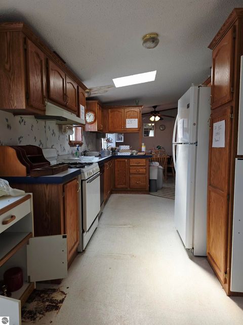 Tiny photo for 115 Miller Road, Tawas City, MI 48763 (MLS # 1943285)