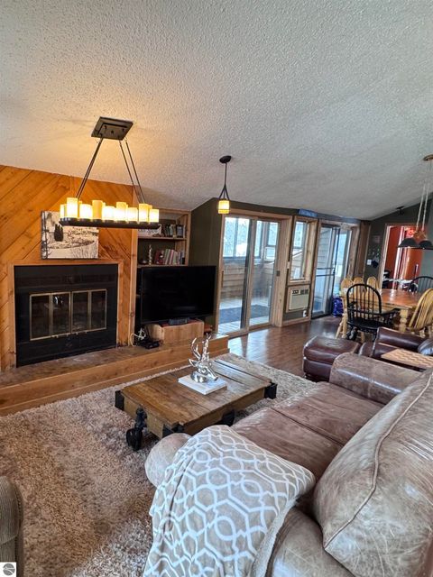 Tiny photo for 6520 Schuss Mountain Lane #209, Mancelona, MI 49659 (MLS # 1942222)