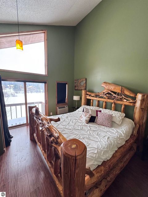 Tiny photo for 6520 Schuss Mountain Lane #209, Mancelona, MI 49659 (MLS # 1942222)