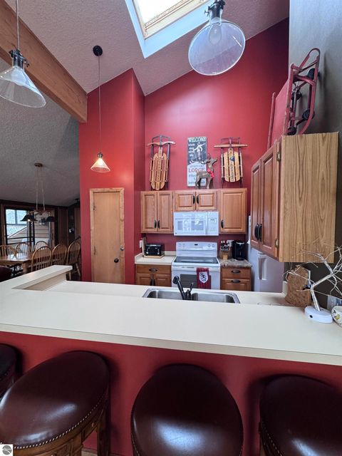 Tiny photo for 6520 Schuss Mountain Lane #209, Mancelona, MI 49659 (MLS # 1942222)