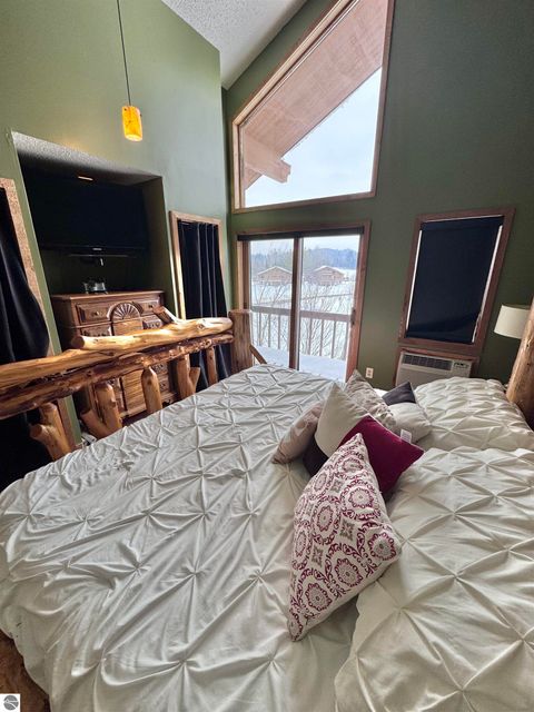 Tiny photo for 6520 Schuss Mountain Lane #209, Mancelona, MI 49659 (MLS # 1942222)