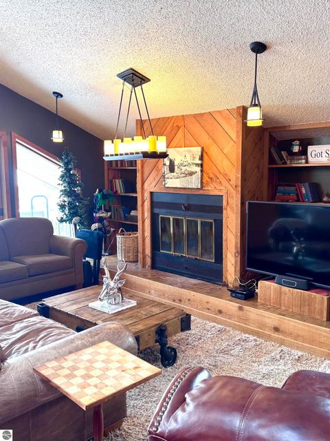 Tiny photo for 6520 Schuss Mountain Lane #209, Mancelona, MI 49659 (MLS # 1942222)