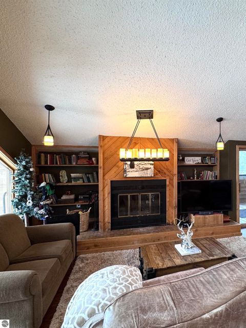 Tiny photo for 6520 Schuss Mountain Lane #209, Mancelona, MI 49659 (MLS # 1942222)