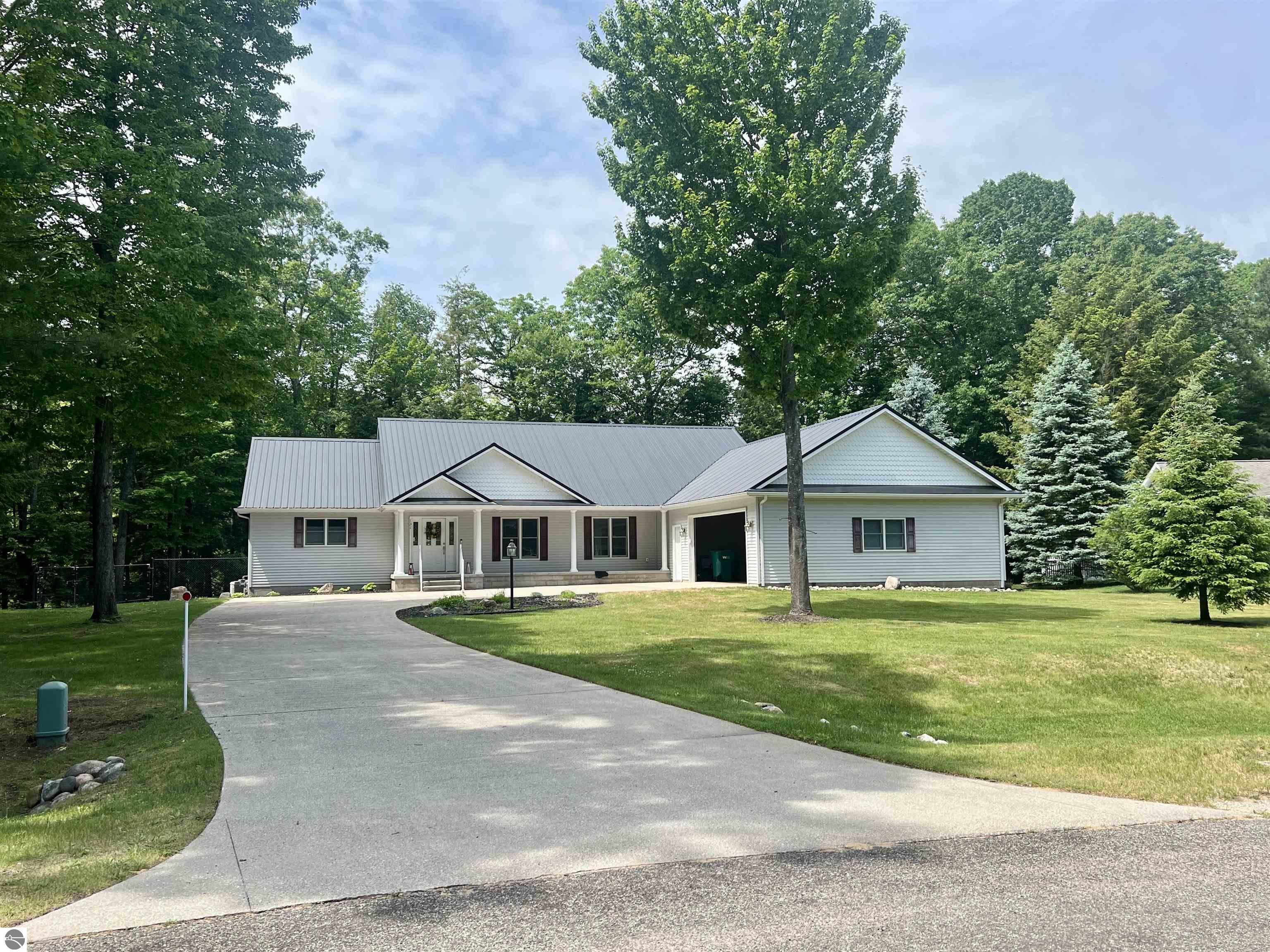 Photo 1 of 76 — 131 Indian Oaks Trail, Prudenville, MI 48651