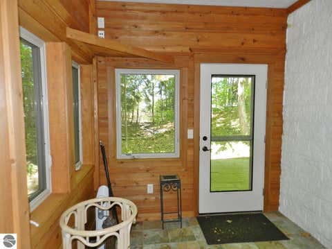 Tiny photo for 12055 S Woodwinds Circle #23, Traverse City, MI 49684 (MLS # 1946905)