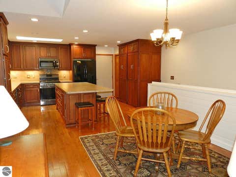Tiny photo for 12055 S Woodwinds Circle #23, Traverse City, MI 49684 (MLS # 1946905)