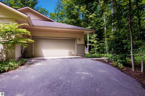 Tiny photo for 12055 S Woodwinds Circle #23, Traverse City, MI 49684 (MLS # 1946905)